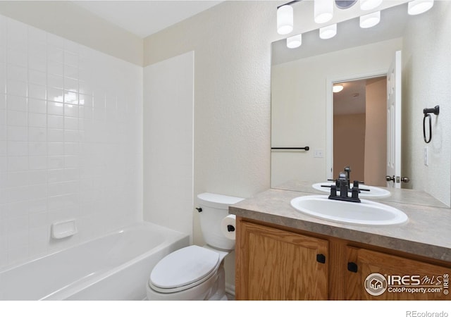 full bathroom with shower / tub combination, toilet, and vanity