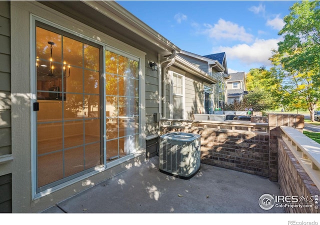 view of patio / terrace featuring central AC unit