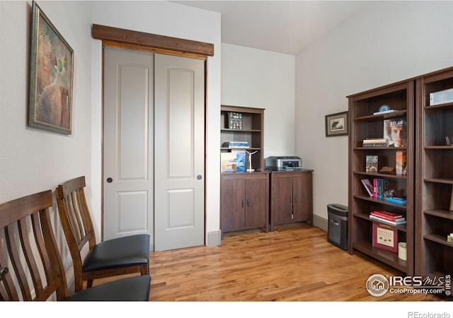 office space with light hardwood / wood-style floors