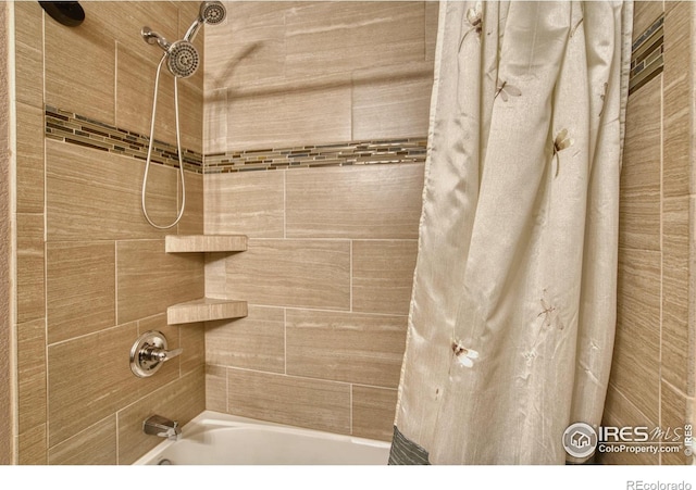 bathroom with shower / bath combo