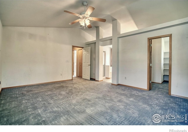 unfurnished bedroom with ceiling fan, high vaulted ceiling, a closet, a spacious closet, and carpet floors