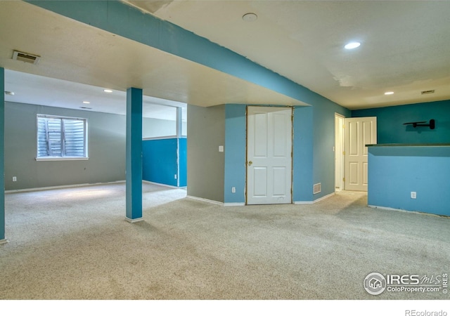 basement with light carpet