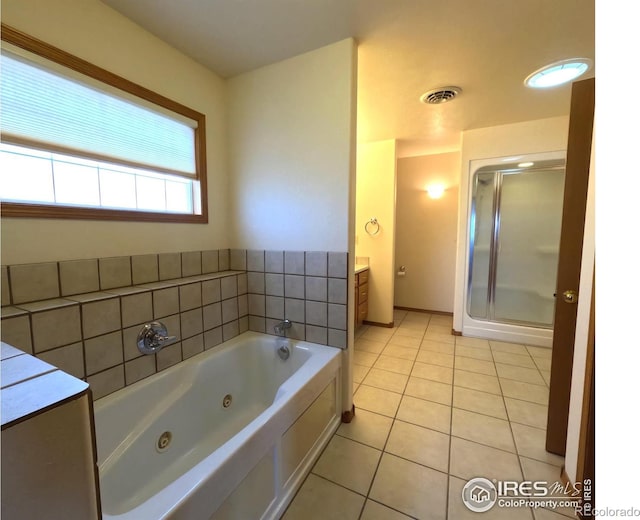 full bathroom featuring visible vents, a shower stall, a jetted tub, tile patterned floors, and vanity