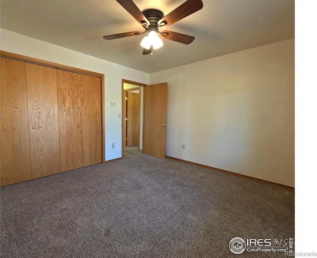 unfurnished bedroom with a closet, carpet floors, and ceiling fan