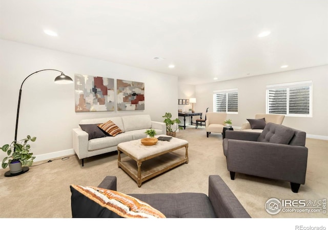 living room featuring light colored carpet