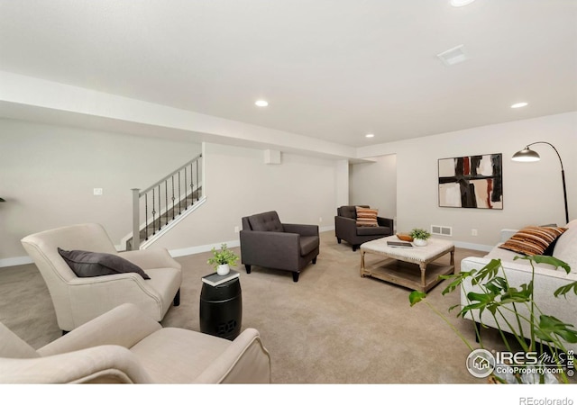 living room featuring light colored carpet