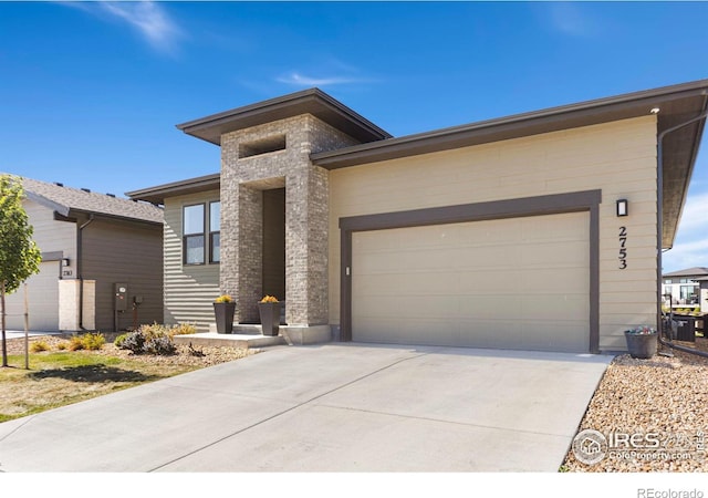 view of front of home with a garage