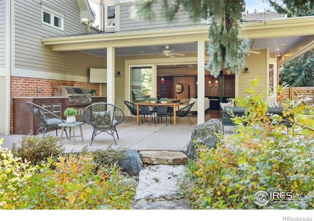 view of patio / terrace with grilling area and ceiling fan