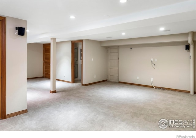 basement with light colored carpet