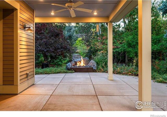 view of patio / terrace featuring ceiling fan