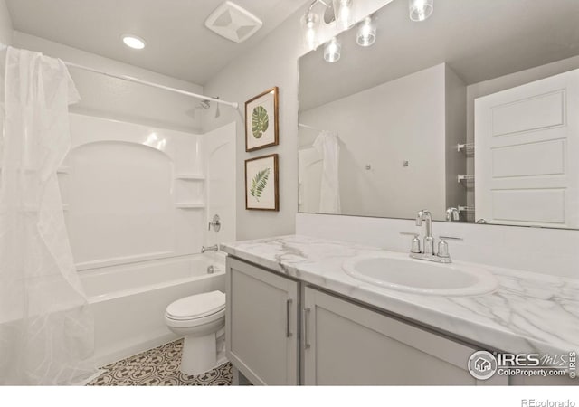 full bathroom with vanity, tile patterned flooring, shower / bath combination with curtain, and toilet