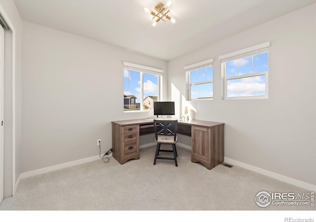 home office featuring light colored carpet