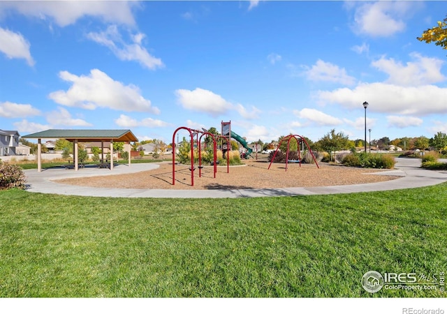 view of playground with a lawn