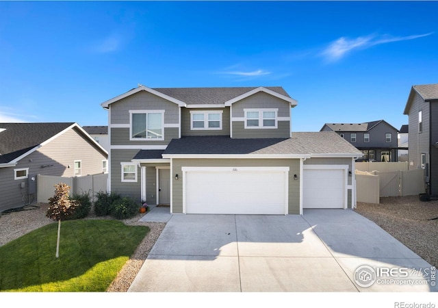 view of front facade featuring a garage and a front yard