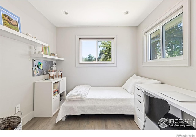 bedroom featuring light wood-type flooring