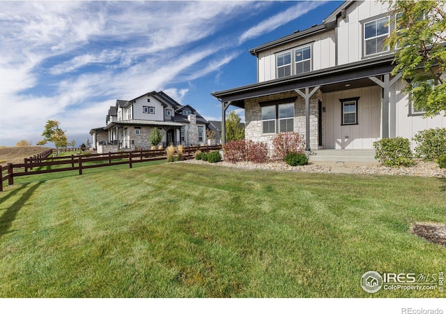 view of yard with covered porch