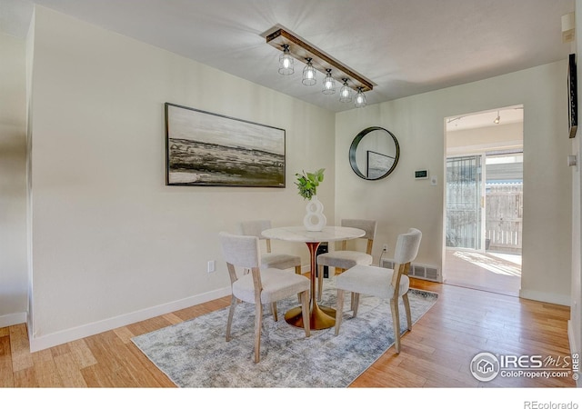 dining room featuring light wood-type flooring