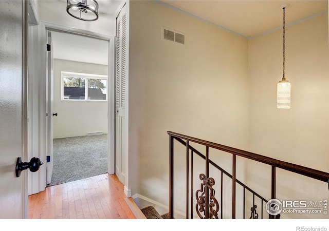 hall featuring light hardwood / wood-style flooring