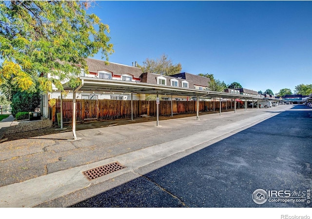 exterior space featuring a carport