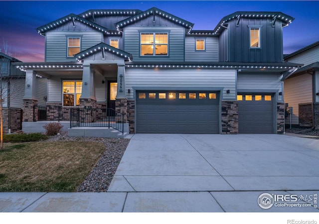 view of front of property featuring a garage