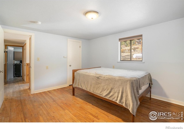 bedroom featuring wood-type flooring