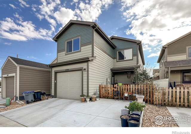 view of front of property with a garage