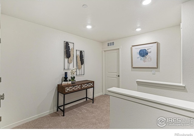 1731 Floating Leaf Dr Unit A, Fort Collins, CO 80528 - hallway featuring light colored carpet, recessed lighting, and baseboards
