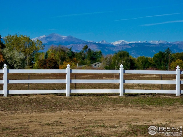 mountain view featuring a rural view