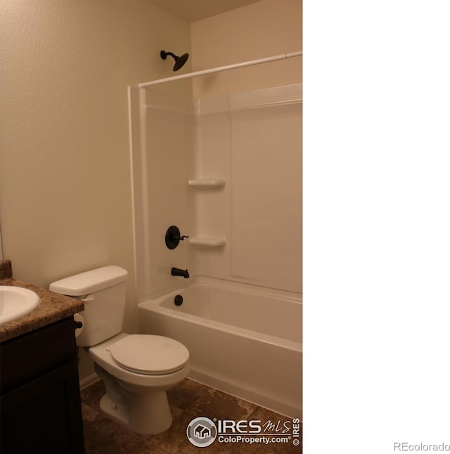 full bathroom with vanity, toilet, and shower / bathtub combination