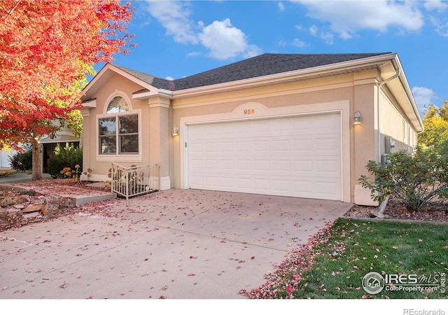 ranch-style home featuring a garage