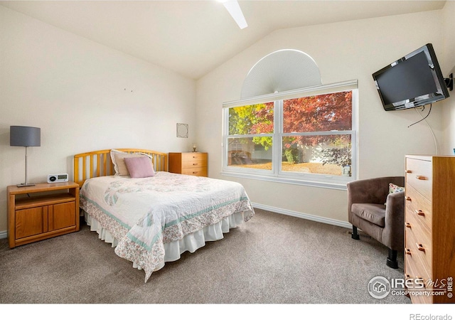 carpeted bedroom featuring lofted ceiling and ceiling fan