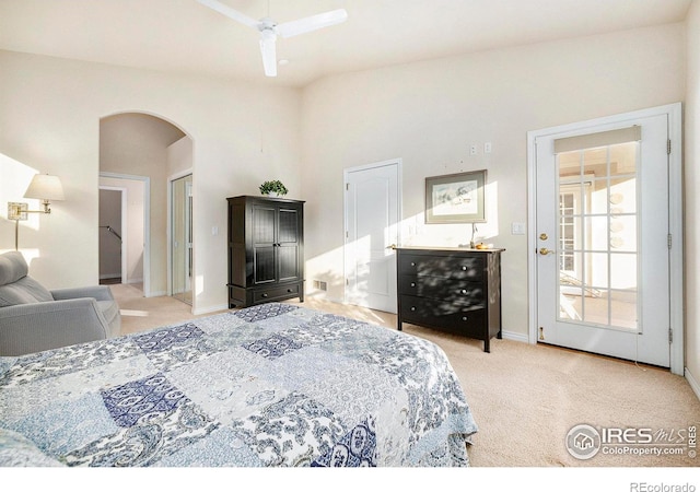 carpeted bedroom featuring access to outside and ceiling fan