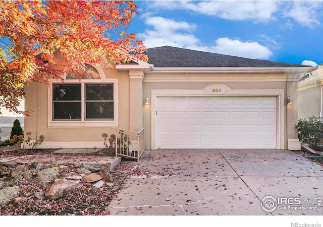 view of front of property with a garage