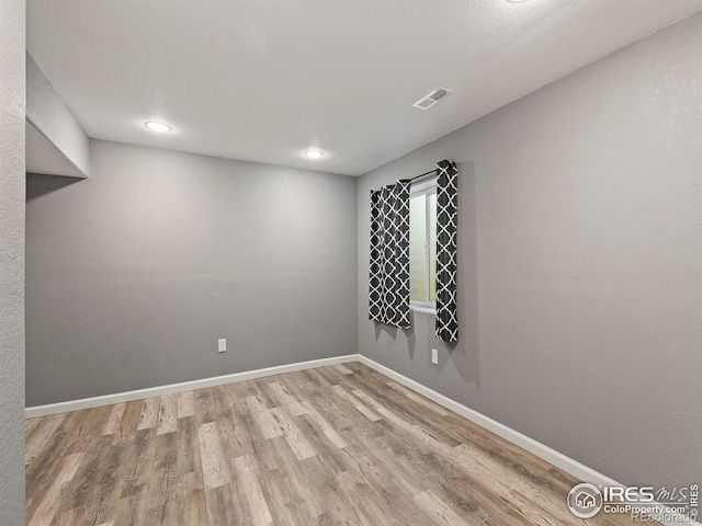 empty room featuring light wood-type flooring