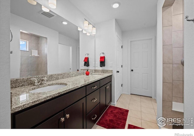 bathroom with vanity and tile patterned floors