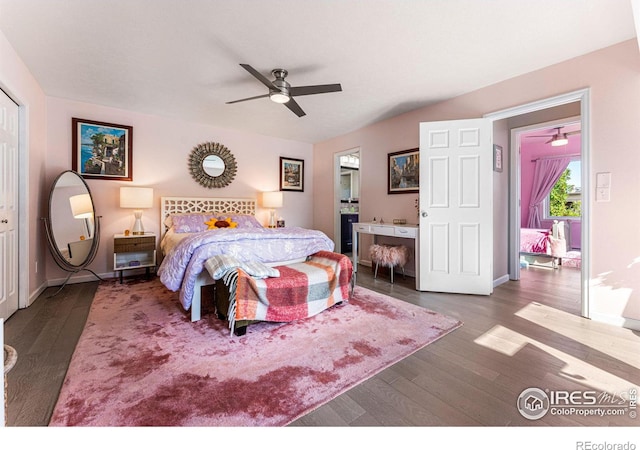 bedroom featuring connected bathroom, ceiling fan, baseboards, and wood finished floors