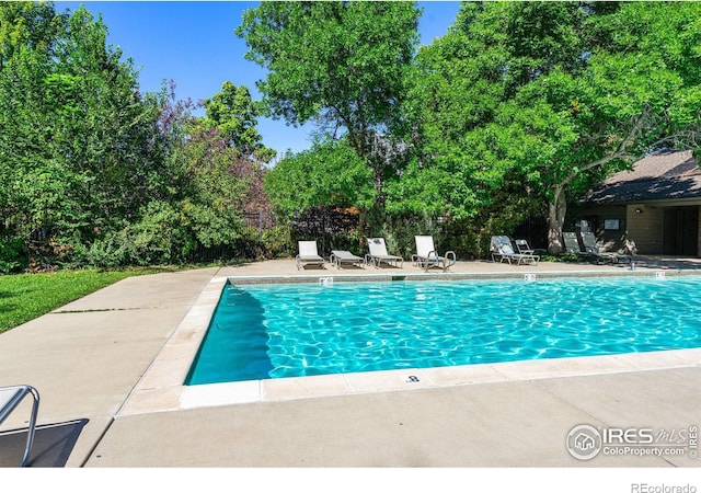 pool featuring a patio