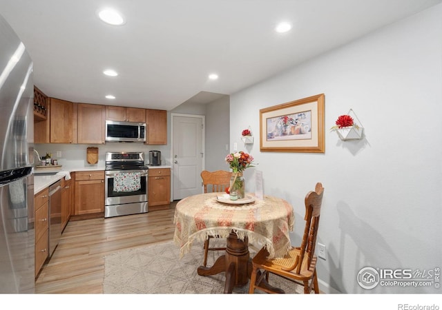 kitchen featuring light hardwood / wood-style floors and stainless steel appliances