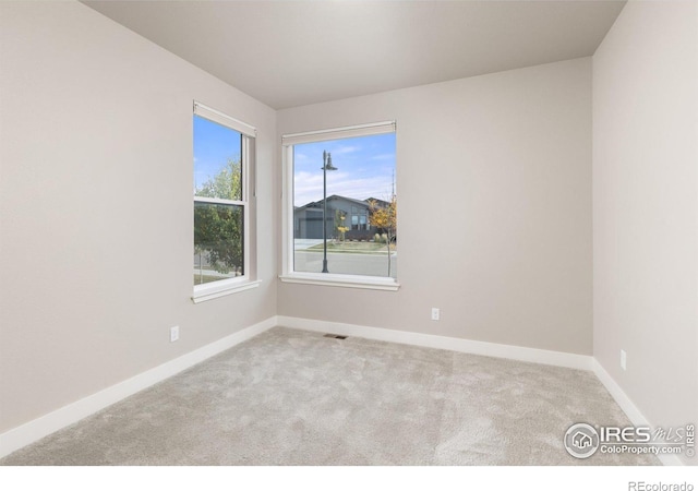 view of carpeted spare room