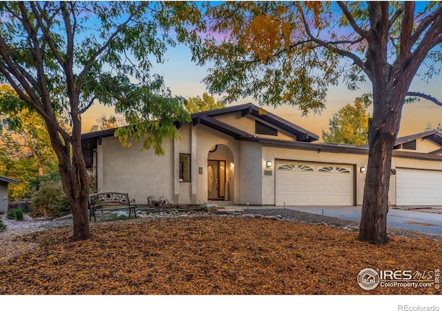 view of front of home featuring a garage