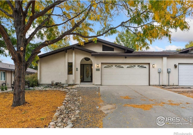 single story home featuring a garage