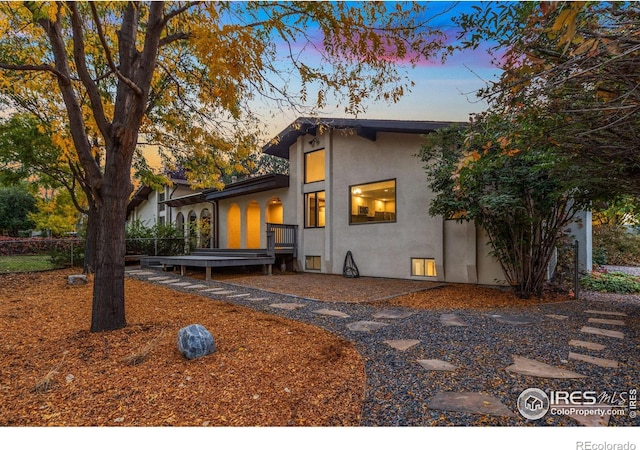 exterior space featuring a wooden deck