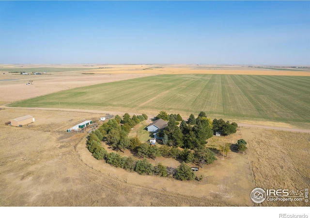 birds eye view of property featuring a rural view