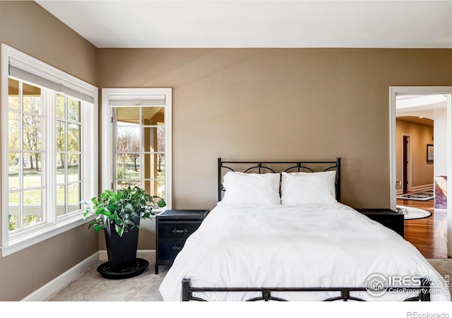 bedroom featuring hardwood / wood-style floors