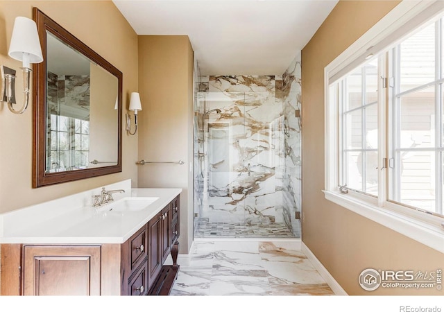 bathroom with vanity and walk in shower