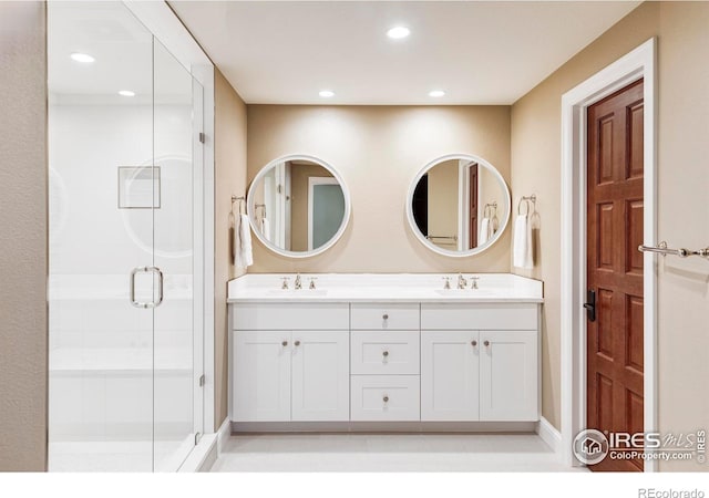 bathroom featuring vanity and walk in shower