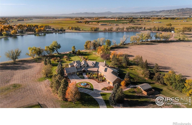 bird's eye view featuring a water and mountain view