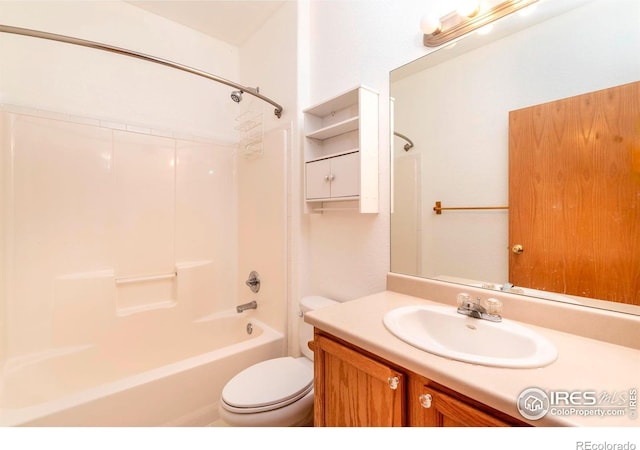 full bathroom featuring toilet, shower / washtub combination, and vanity