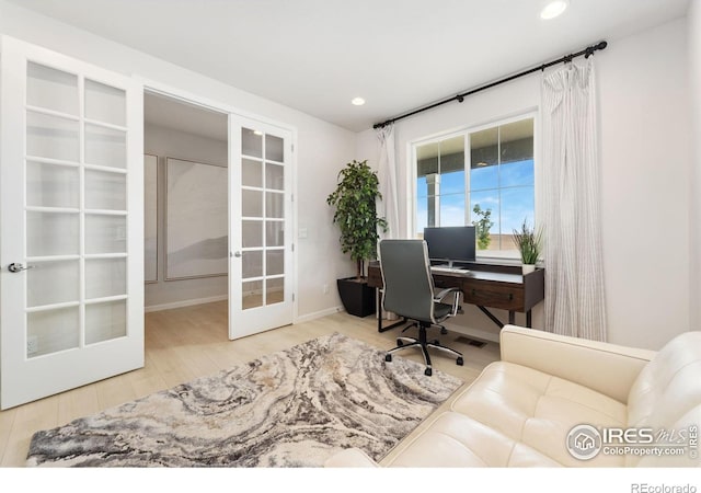 office area with french doors and wood-type flooring