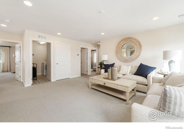 living room featuring light colored carpet